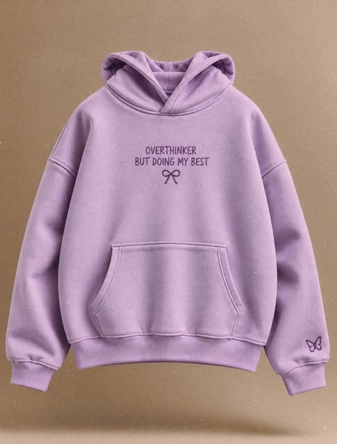 A lavender hoodie with a small embroidered message and heart.
